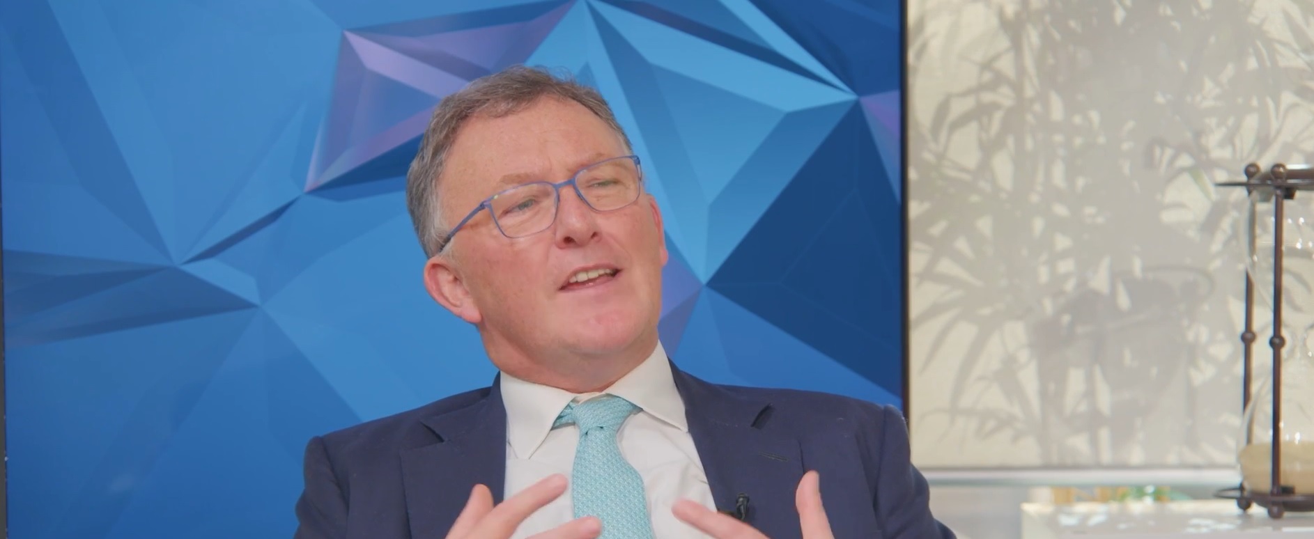 Tom Carroll talking in television studio