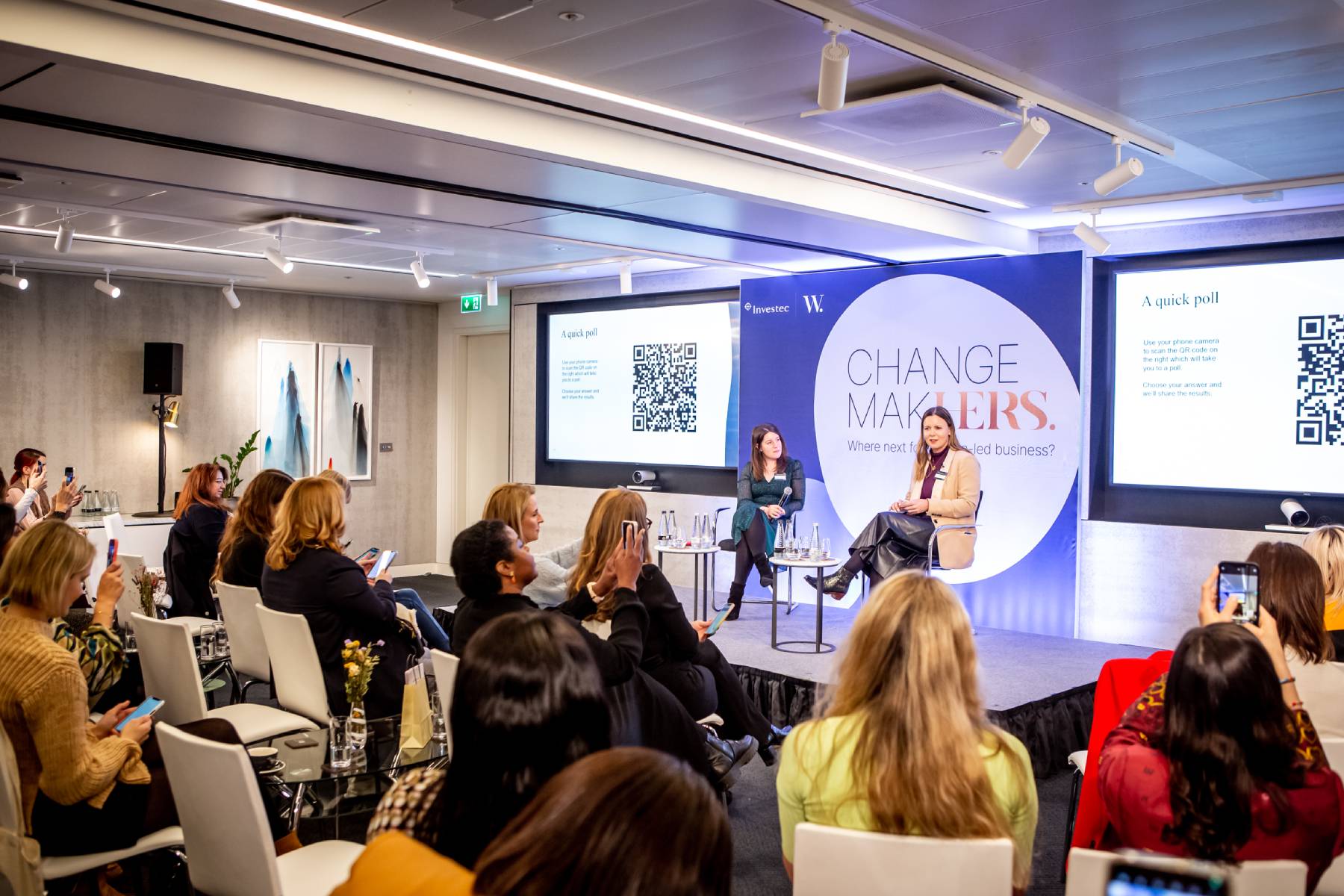 Speakers at a Women's Chapter event at Rathbones have a discussion with their audience