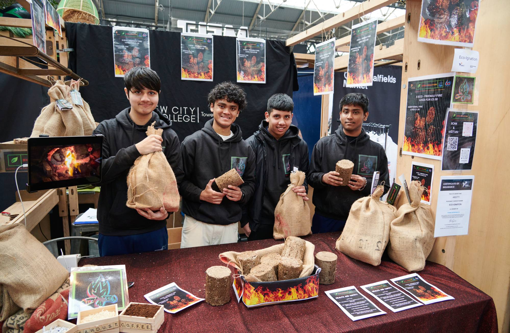 Students of Young Enterprise selling products they've made at a trade fair in London