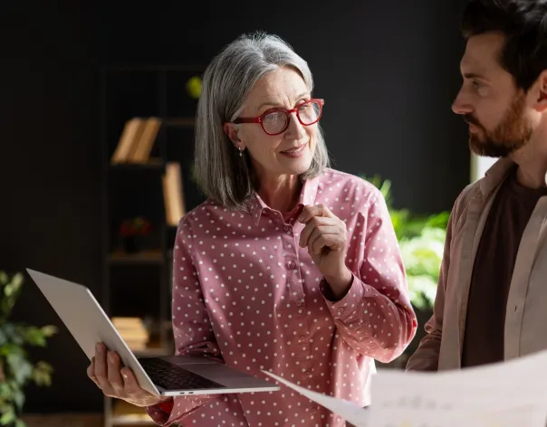 Two charity trustees discussing how their charity manage investment risk effectively