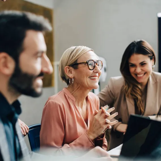 Group of people discussing in a living room