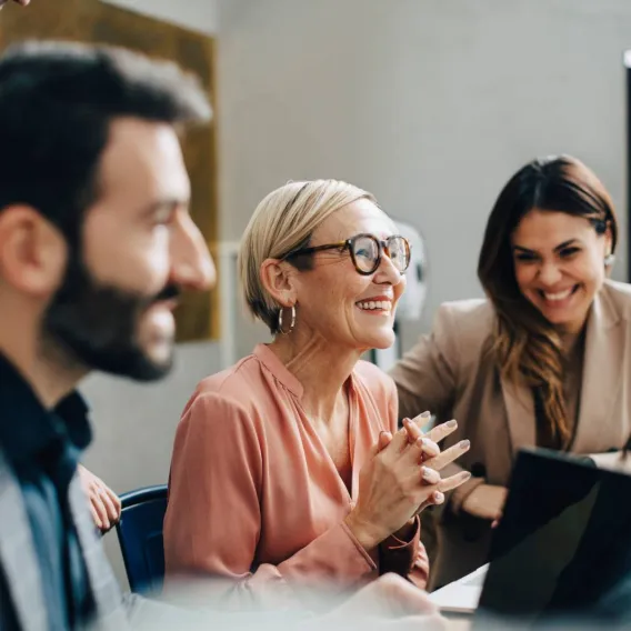 Group of people discussing in a living room