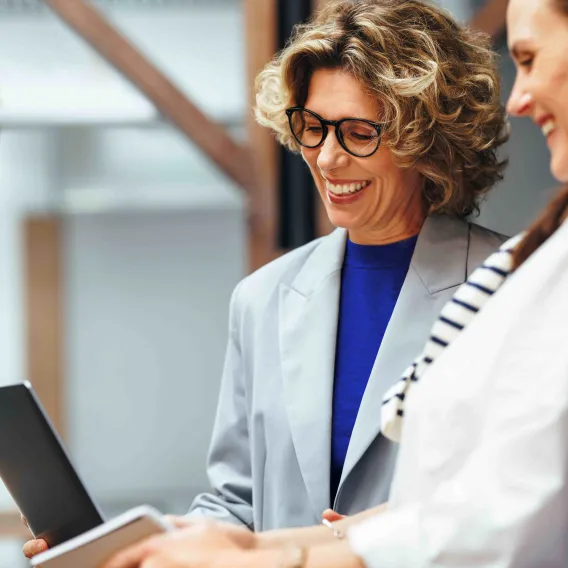 Woman laughing in an armchair