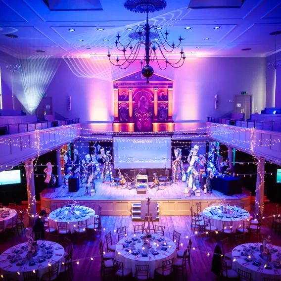 The theatre room of St George's Bristol being set-up for a gala dinner