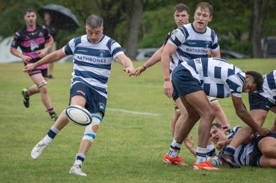 A Heriots Rugby Club player kicks out of a ruck