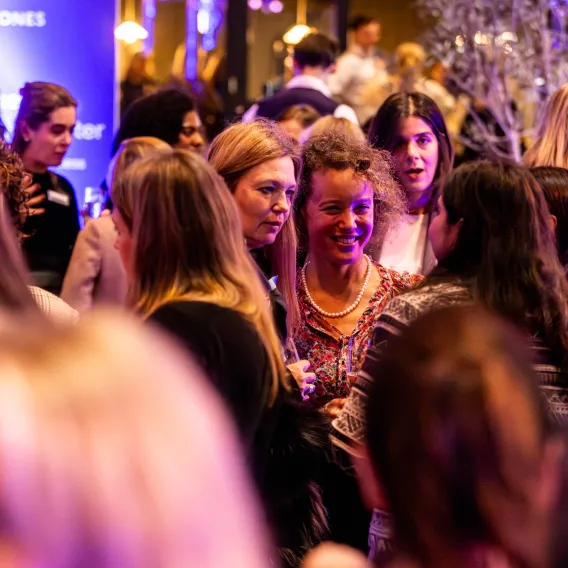 Attendees network together at a joint Rathbones and Women's Chapter event