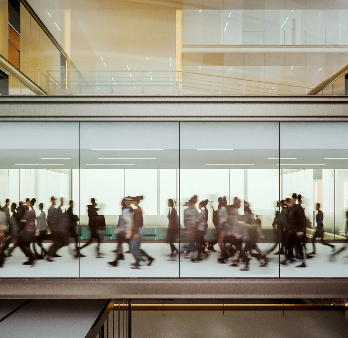 People walking in a busy office