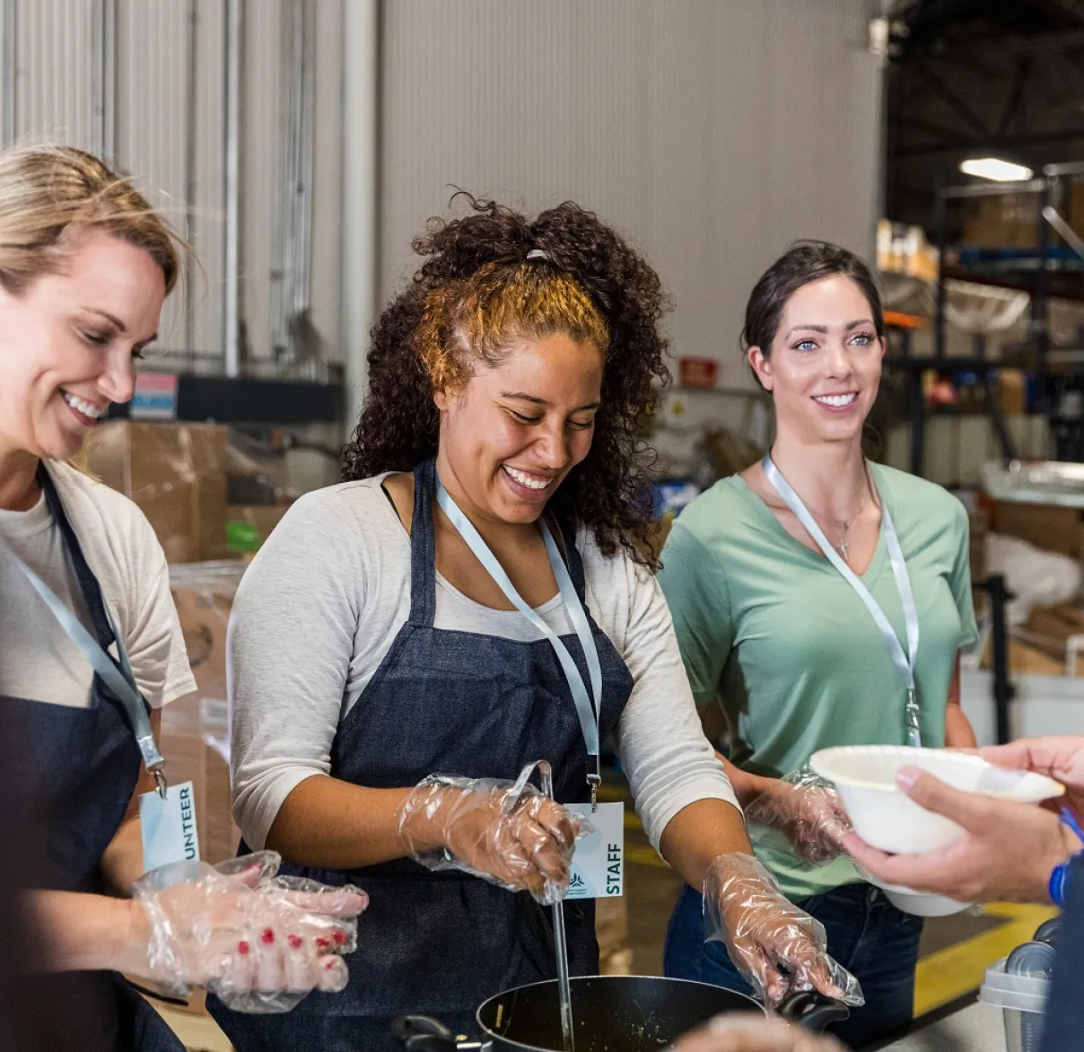 A group of people at an event discussing charity investment 