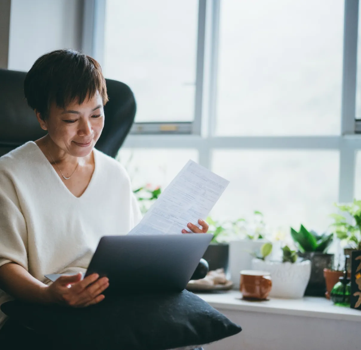 Senior woman looking at pension statement