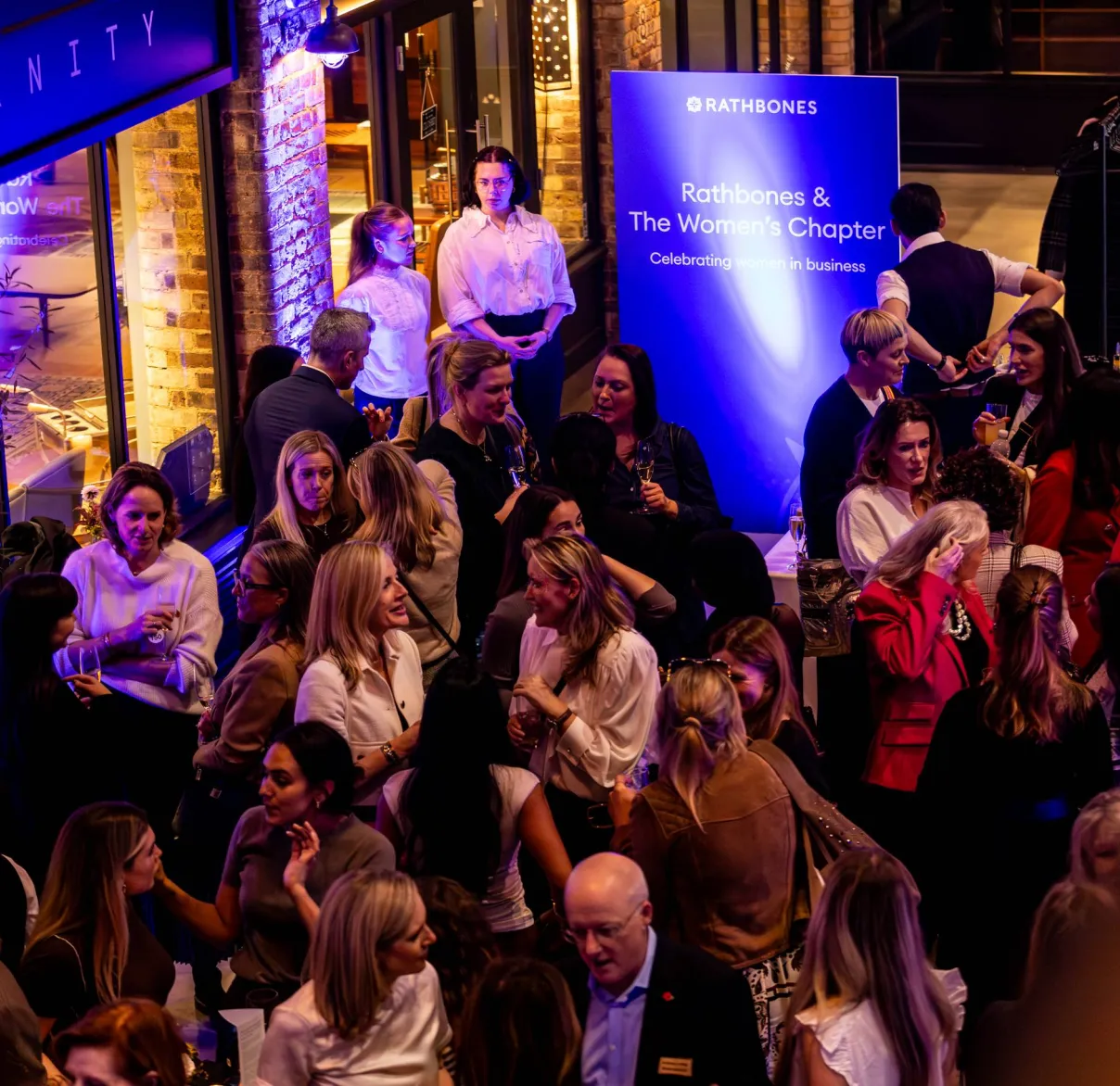 Attendees network together at a joint Rathbones and Women's Chapter event