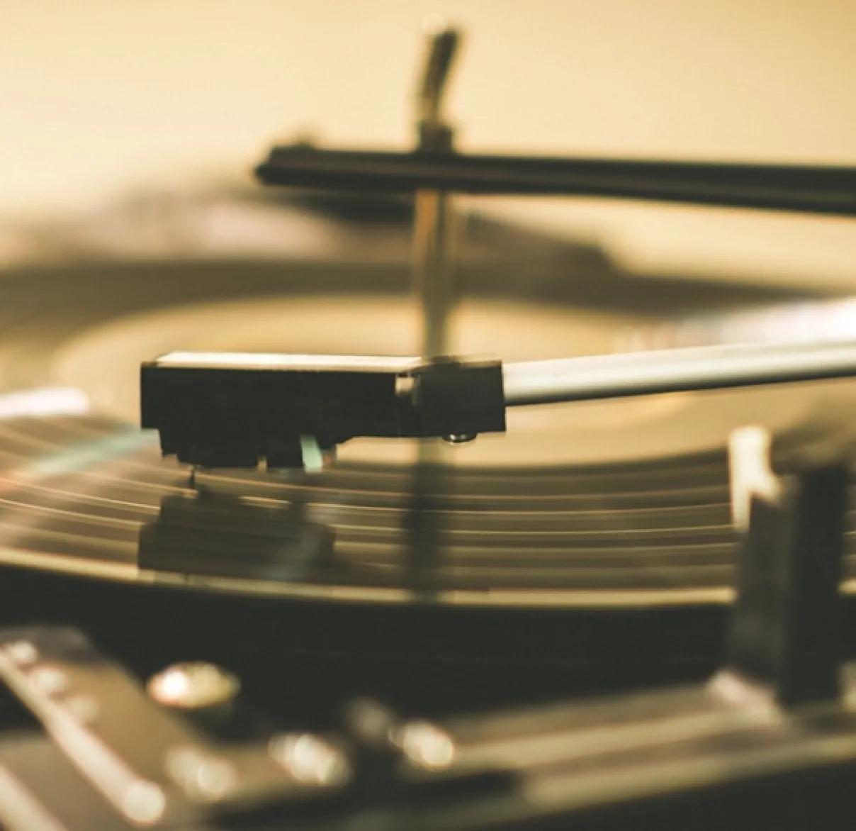 A close-up of a record player with a record rotating