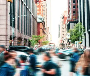 people rushing in the busy city