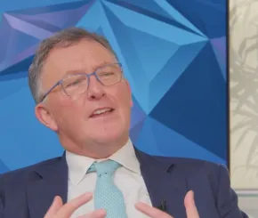 Tom Carroll talking in television studio