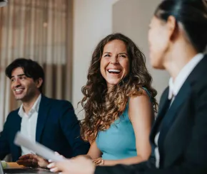 Group of happy people working together in an office