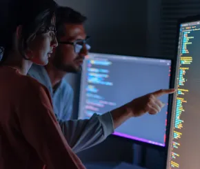 2_people_using_screen