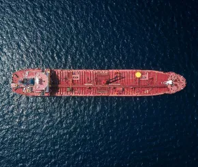 Large red oil tanker on sea