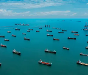 Aerial view oil ship tanker waiting on the sea for load or unload oil from refinery. 