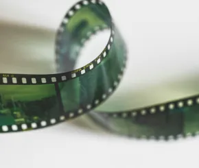 A twisting reel of film