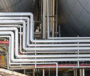 Industrial pipework between large storage tanks