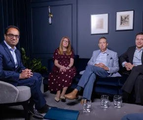Sanjiv, Claire, Simon and Ben speaking on a panel about whether AI investment is a bubble