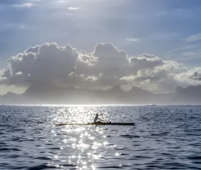 paddling through calm waters