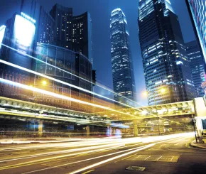 car_light_trails_and_urban_landscape_in_hong_kong.jpg