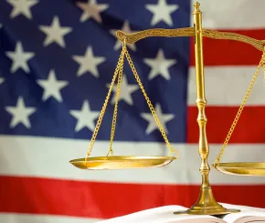 us-flag-and-scales-1200x628.jpg