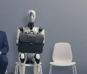 image_man_and_ai_robot_waiting_for_a_job_inte_david_turner.jpg