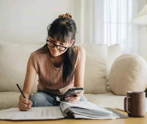 Lady on phone with couch
