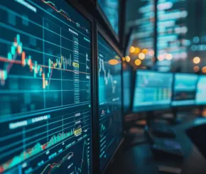 image of computer screen with trading graphs showing market changes