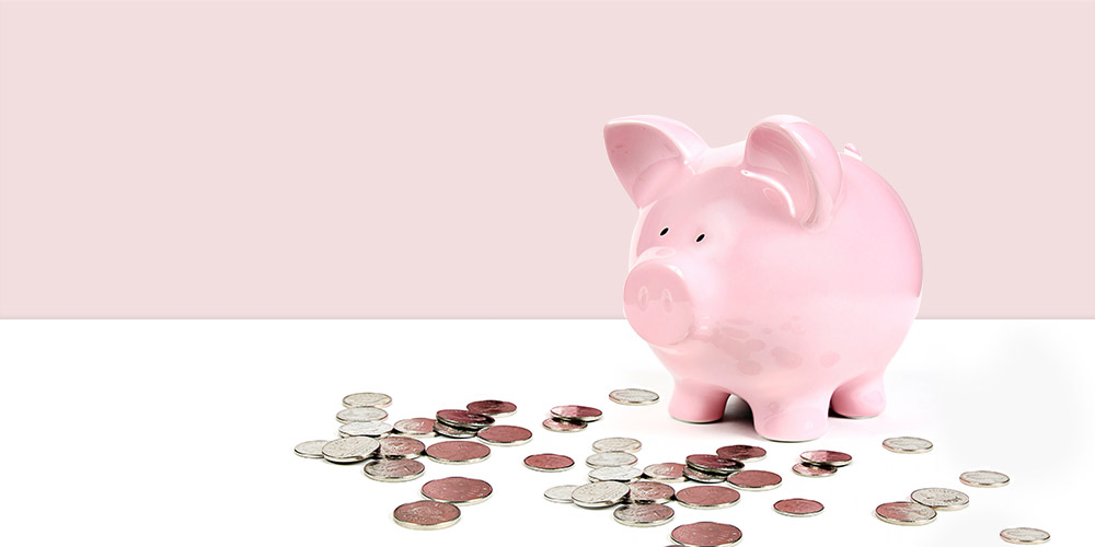 Making the most of ISAs - Rathbone Investment Management Pink 'piggy bank' surrounded by spare change - Rathbone Investment Management