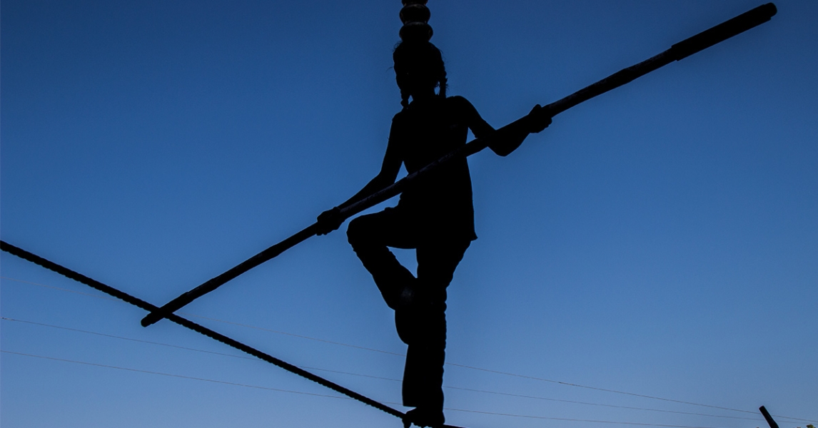 Person balancing on a rope
