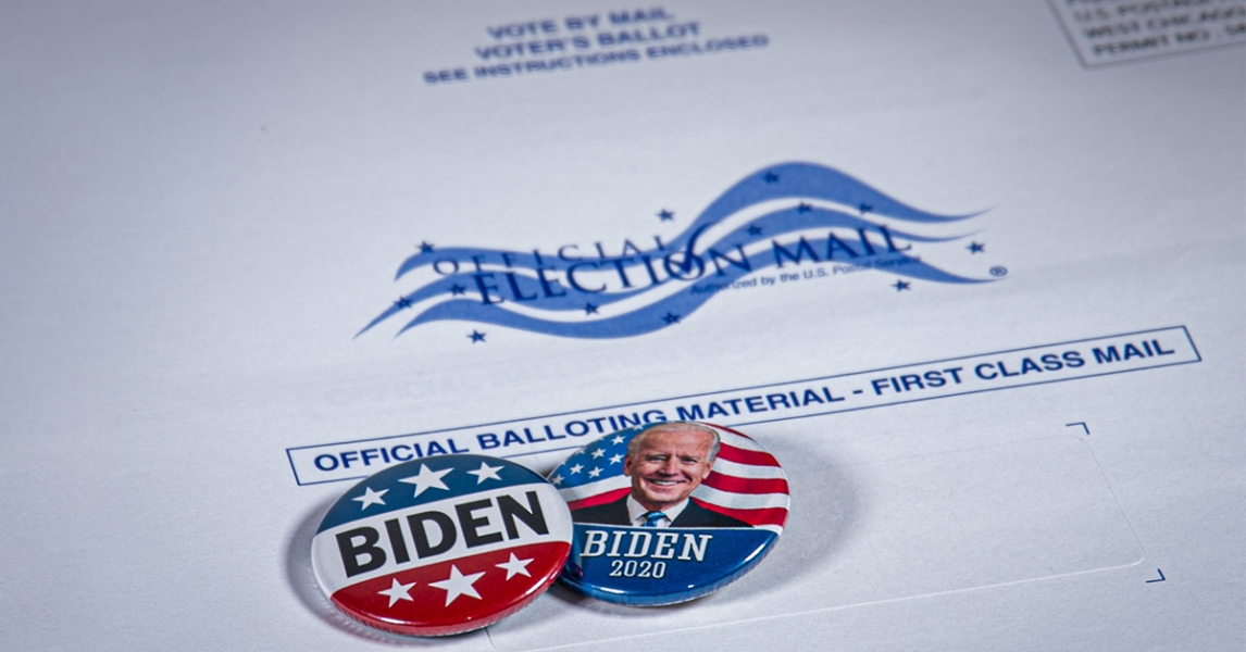Biden badge on election mail envelope