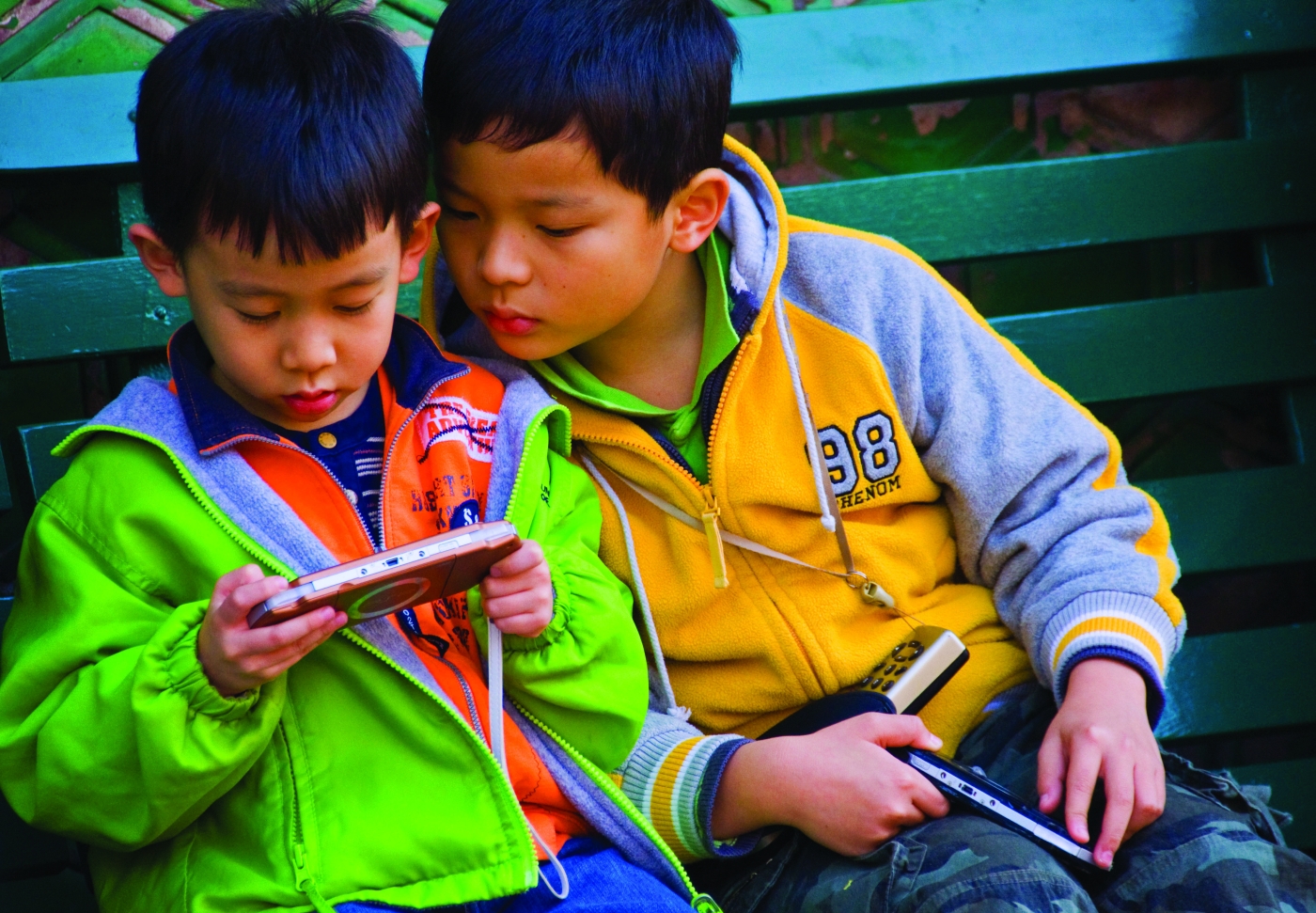 Children looking at phone