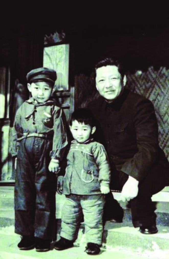 Xi Jinping with his father and brother